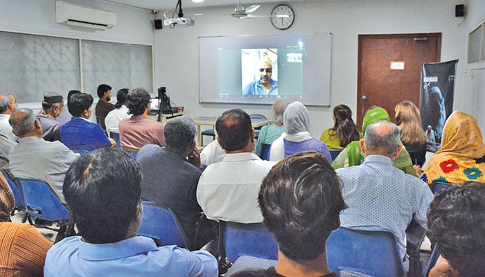 Szabist’s Dr Riaz Ahmed Shaikh addressing after the screening of  the documentary Hum Saya (Neighbour) at Szabist University on Oct 2, 2024. — The News/Shoaib Ahmed