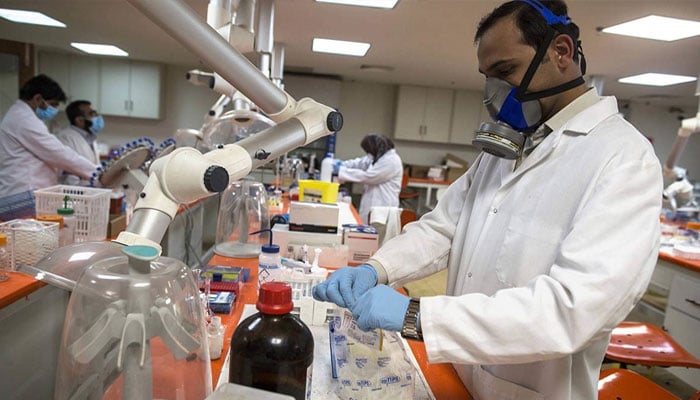 A representational image showing a researcher in a lab. — Reuters/File