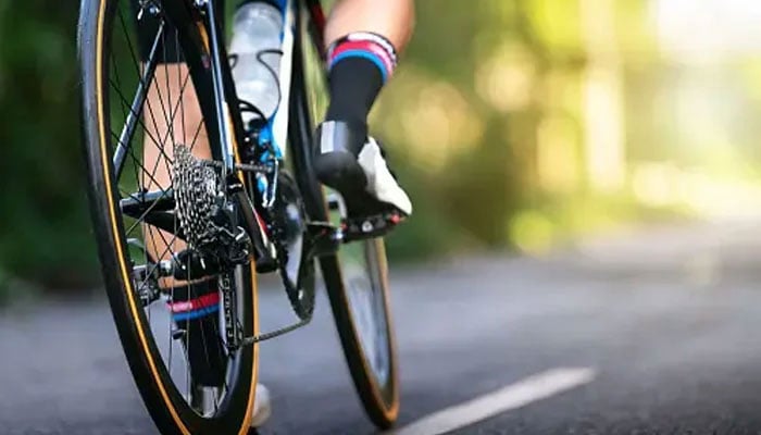 Representational image showing a person cycle on the road. — Unsplash