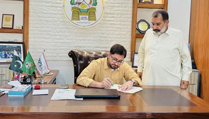 Adnan Khan seen taking charge of his office as  vice-president of the Bajaur Chamber of Commerce and Industry (BCCI).  — Facebook/@bccikhar