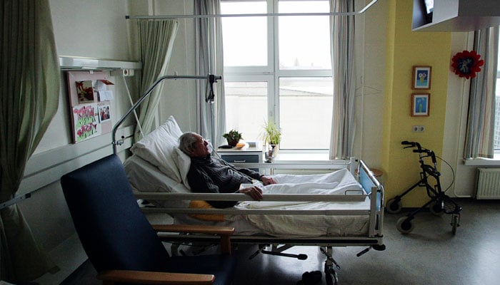 An unidentified man suffering from Alzheimers disease and who refused to eat sleeps peacefully the day before passing away in a nursing home in the Netherlands. — Reuters