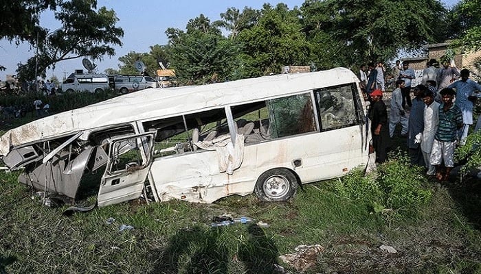 The representational image shows residents gathering around the wreckage of a van alongside a railway track following the accident between a train and a van transporting Sikh pilgrims, in Punjab on July 3, 2020. — AFP/File