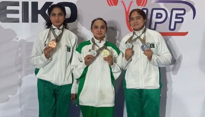 The Sohail sisters posing with their medals at the Commonwealth Powerlifting Championship in Sun City, South Africa. — Author