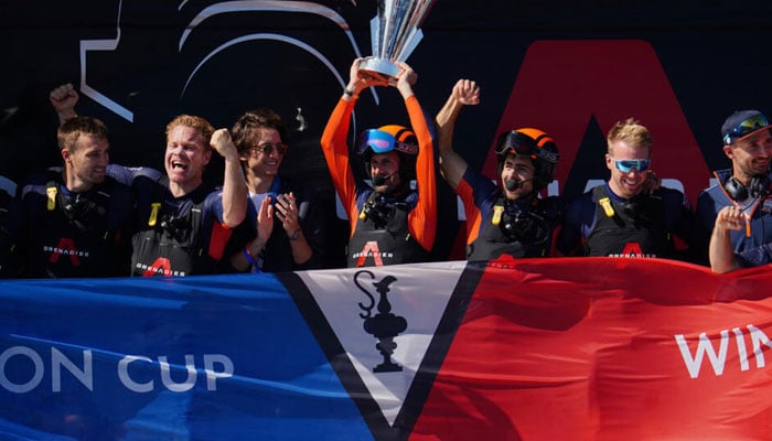 Four-time Olympic champion Ben Ainslie (centre).—  AFP/.file