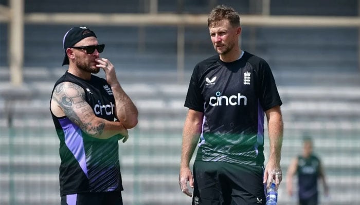 England coach Brendon McCullam and Joe Root seen in Lahore.— PCB website/file