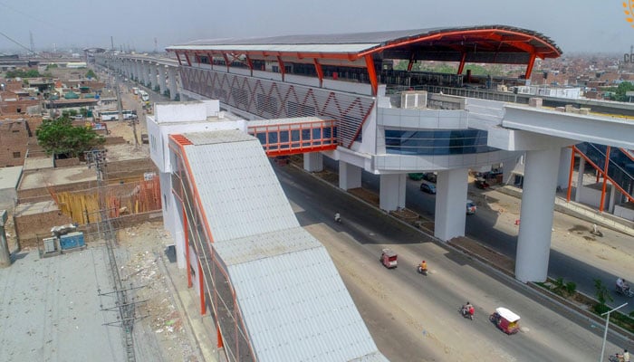 The image shows Dera Gujjran Station of Lahore Orange Line Metro Train. — Facebook/Orangelinelahore