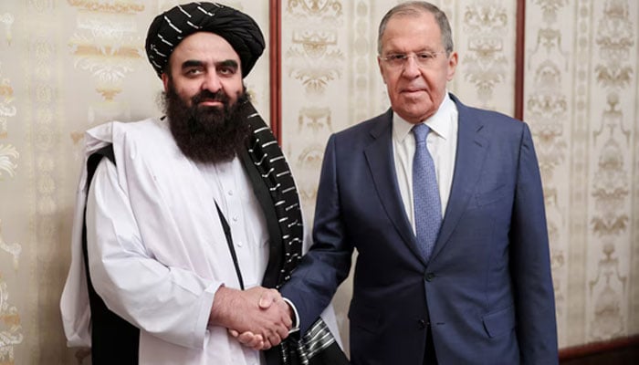 Russian Foreign Minister Sergei Lavrov shakes hands with Acting Foreign Minister of Afghanistans Taliban movement Amir Khan Muttaqi during a meeting in Moscow, Russia, October 4, 2024. — Reuters