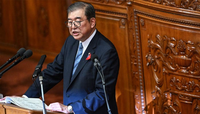 Japans new Prime Minister Shigeru Ishiba delivers his inaugural policy address on Friday. — AFP/file