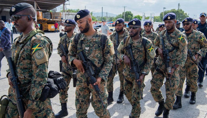 Jamaican soldiers and police officers arrive at Toussaint Louverture International Airport in Port-au-Prince, Haiti, on September 12, 2024, as part of an international policing mission.— AFP