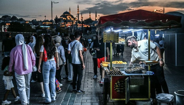 A street vendor sells corn in the Eminönü district of İstanbul on August 29, 2024. — Reuters