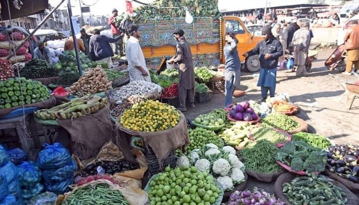 Vendors seen selling vegetables at the fruit and vegetable market on February 6, 2024. — Online