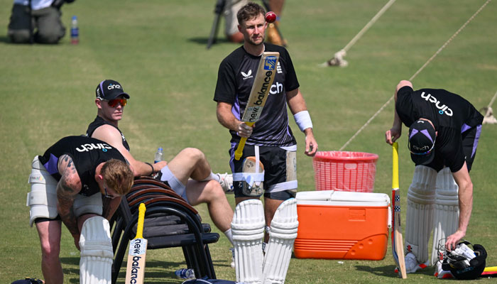 Englands Joe Root (centre) attends a practice session at the Multan Cricket Stadium in Multan on October 4, 2024. — AFP