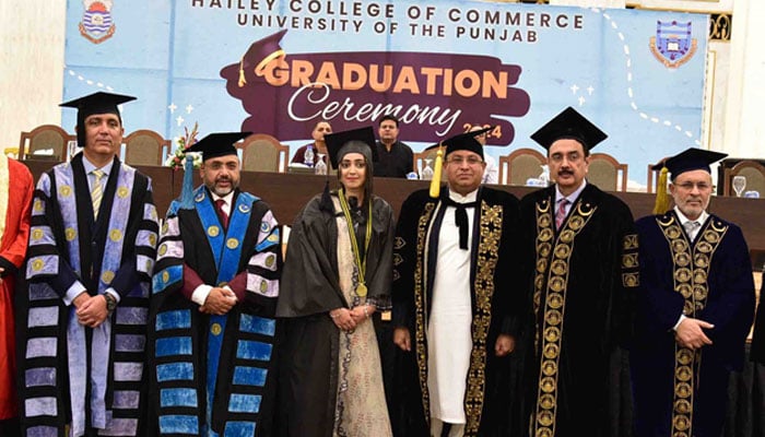 Provincial Minister for Finance Mujtaba Shuja-ur-Rehman (from 3rd right) poses for a photo at the graduation ceremony organised by Punjab University Hailey College of Commerce on October 5, 2024. — Facebook/University of the Punjab