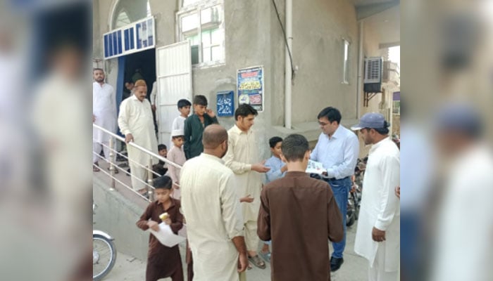 Dr Asif Arbab Niazi, CEO of Health Authority Rawal­pindi in an awareness campaign in Chak Jalal Din on October 5, 2024. — Facebook/District Health Authority Rawalpindi