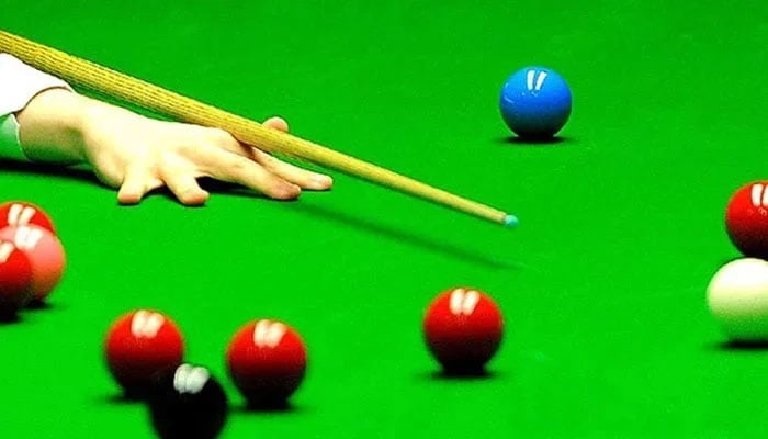 A representational image showing a snooker player taking a shot. — AFP/File