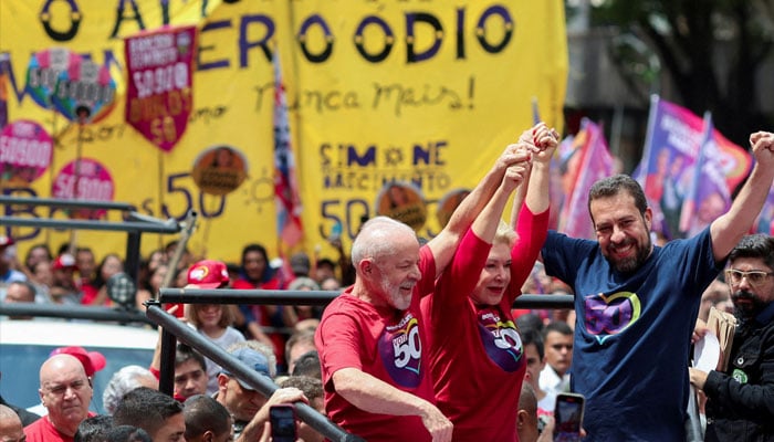 Sao Paulo Mayor candidate Guilherme Boulos takes part in a rally with his vice-mayor candidate Marta Suplicy and Brazils President Luiz Inacio Lula da Silva, in Sao Paulo, Brazil October 5, 2024. — Reuters