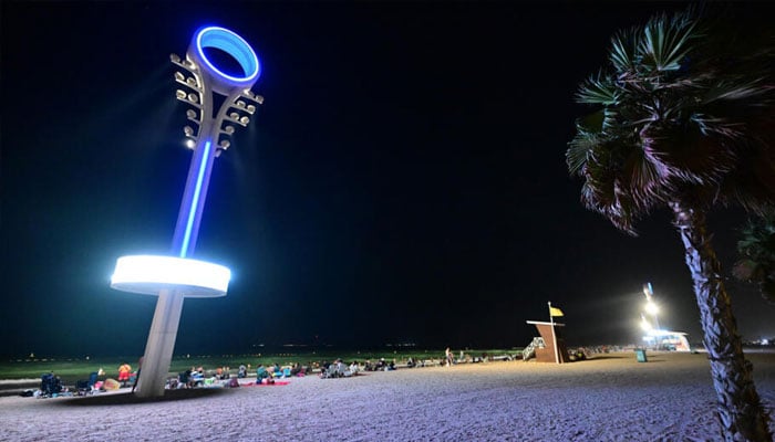 Floodlights illuminate the Umm Suqeim beach in Dubai to make it safer for beachgoers at night when the scorching heat of the Gulf has abated. — AFP/file