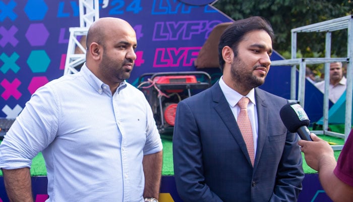 Provincial Education Minister Rana Sikandar Hayat (left) and Punjab Minister for Youth Affairs and Sports Malik Faisal Ayub Khokhar address a press conference at Adabi Baithak, Alhamra Mall Road on October 7, 2024. — Facebook/Lahore Youth Festival