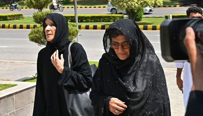 PTI founder Imran Khans sisters Aleema Khan (right) and Uzma Khan sisters of Pakistans former PM Imran Khan, arrive to attend the hearing at the High Court in Islamabad on August 25, 2023. — AFP