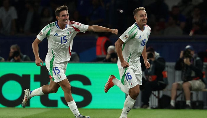 Italian players seen celebrating. — AFP/file