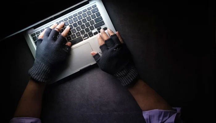 A person seen using a laptop. — AFP/file