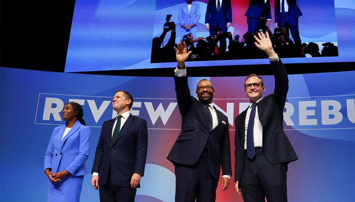 Conservative MPs and leadership candidates Kemi Badenoch, Robert Jenrick, Shadow Home Secretary James Cleverly and Tom Tugendhat stand together on stage on the final day of the Conservative Party conference in Birmingham, Britain, October 2, 2024. — Reuters