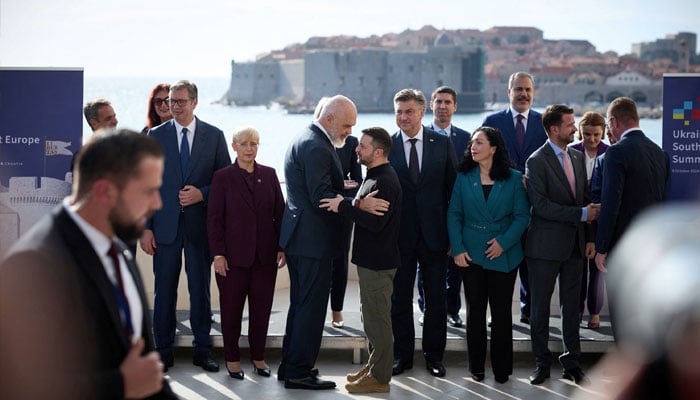 Ukraines President Volodymyr Zelenskiy and Albanias Prime Minister Edi Rama embrace each other before posing for a group picture during the third Ukraine-South East Europe summit, amid Russias attack on Ukraine, in Dubrovnik, Croatia October 9, 2024. — Reuters