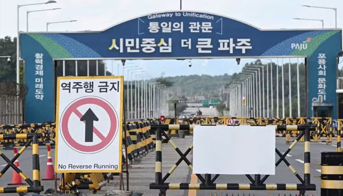 Barricades set up at a military checkpoint on the Tongil bridge, the road leading to North Korea’s Kaesong city, in the border city of Paju on October 9, 2024. — AFP