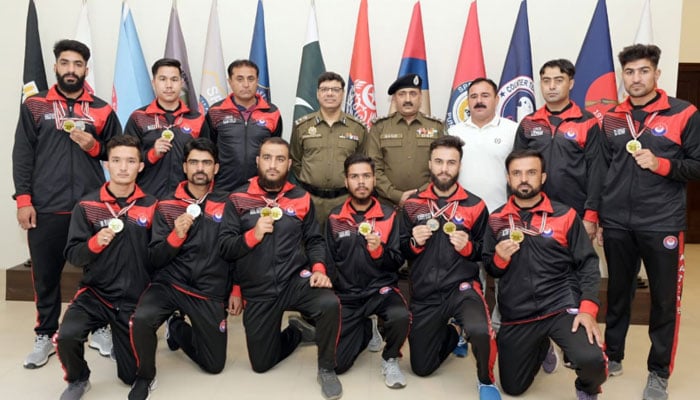 Pakistan Police athletes pose for a group photo with their medals in this image released on October 10, 2024. — Facebook/Punjab Police Pakistan