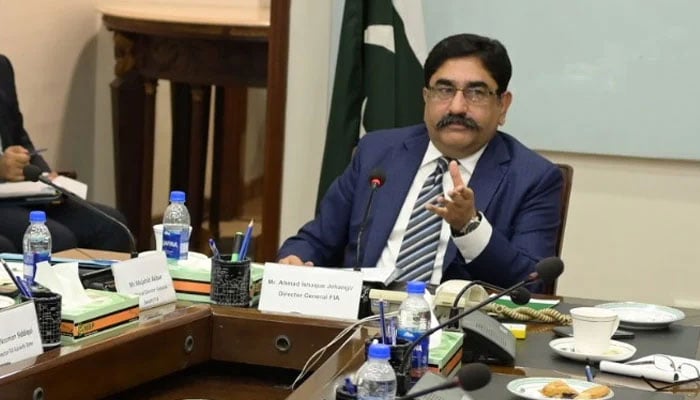 DG FIA Ahmed Ishaq Jahangir gestures while speaking at a meeting on August 28, 2024. — Facebook/Federal Investigation Agency - FIA