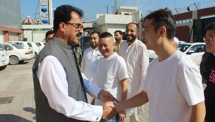 Sarhad Chamber of Commerce and Industry president Fazal Moqeem Khan (left) shaking hands with a three-member Chinese delegation on October 10, 2024. — Facebook/Sarhad Chamber Peshawar