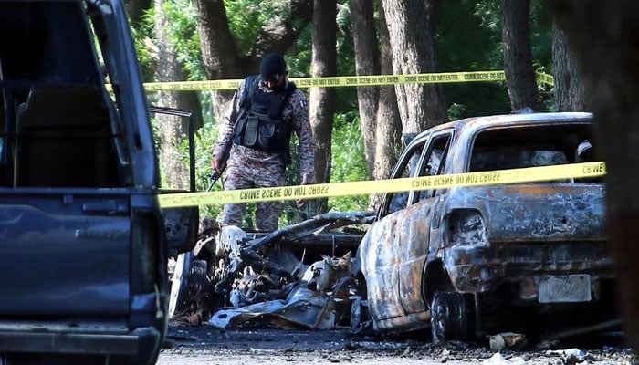 A cordoned off area at the scene of a blast outside the Jinnah International Airport in Karachi on October 7, 2024. — INP