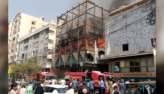 View of a site after a fire broke out incident at a food restaurant building as fire brigade officials are busy in extinguishing fire and rescue operation, at Sindh Muslim Society area in Karachi on October 10, 2024. — PPI