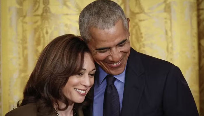 Former President Barack Obama hugs Vice President Kamala Harris during an event to mark the 2010 passage of the Affordable Care Act in the East Room of the White House on April 5, 2022 in Washington, DC. AFP