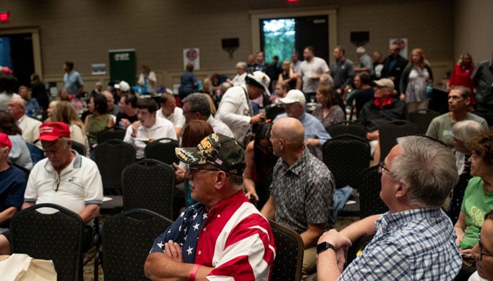 Attendees converse ahead of the first presidential debate between US President Joe Biden and former US President and Republican presidential candidate Donald Trump during a watch party hosted by the Michigan Conservative Coalition in Novi, Michigan, US, June 27, 2024. — Reuters