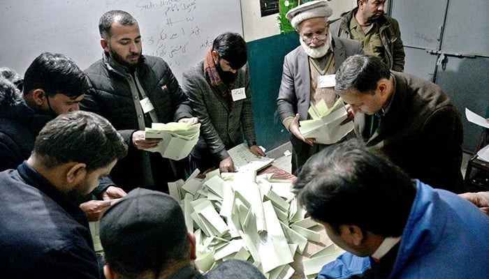 This representational image shows ECP officials counting votes after polling ends during general elections 2024 on February 8, 2024. — APP