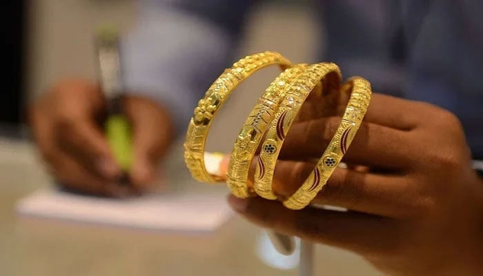 An undated image of gold bangles. — AFP/File