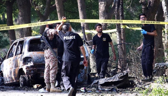 A cordoned off area at the scene of a blast outside the Jinnah International Airport in Karachi on October 7, 2024. — INP