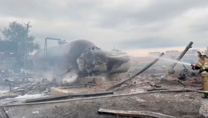 A firefighter extinguishes fire at a fuel station in the Chechen capital Grozny, Russia, in this picture taken from handout video published October 12, 2024. — Reuters