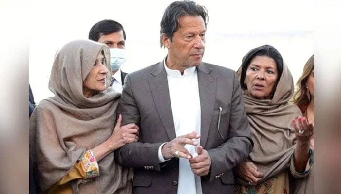 An undated image showing PTI founder Imran Khan (centre) pictured with his sisters Uzma Khan (left) and Aleema Khan. — X/@Aleema_55/File