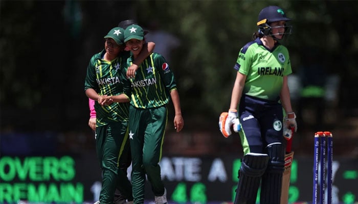 Rida Aslam celebrates wicket with Areesha Noor against Ireland. — ICC/file