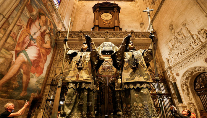 People visit the mausoleum of Christopher Columbus in the cathedral of Seville, Spain, October 11, 2024. — Reuters