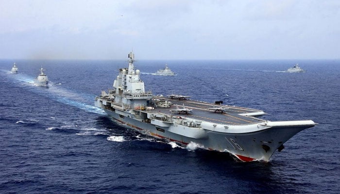 Chinas aircraft carrier Liaoning takes part in a military drill of Chinese Peoples Liberation Army (PLA) Navy in the western Pacific Ocean, April 18, 2018. — Reuters