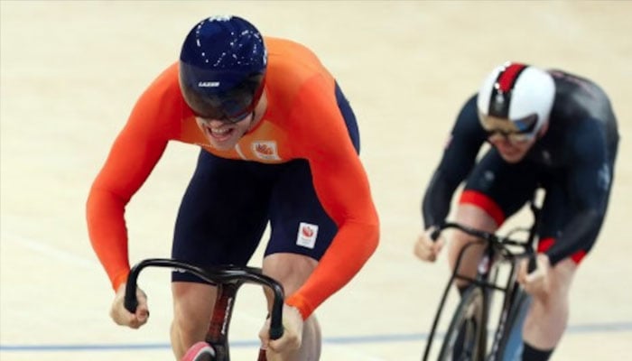 Jack Carlin of Britain (front) and Harrie Lavreysen of Netherlands in action during heat 1. — Reuters/file