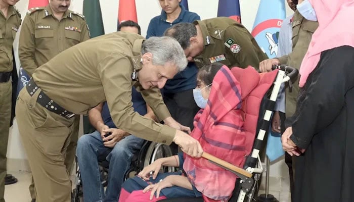 Representational image shows IG Punjab Dr Usman Anwar speaking with children on October 5, 2024. — Screengrab via Facebook/Punjab Police Pakistan