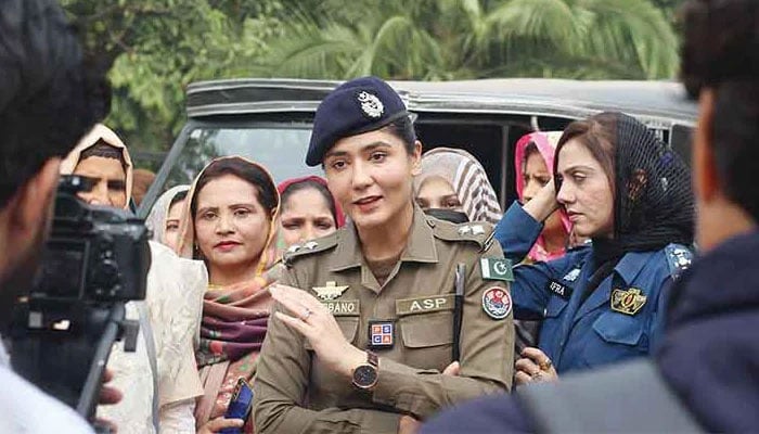 Defence ASP Shehrbano Naqvi gestures while talking to media persons in this undated image. — Supplied