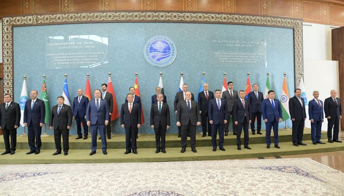 The group photo of Prime Minister Shehbaz Sharif with heads of delegations of the 23rd SCO Heads of Government meeting on Oct 16, 2024. — PID