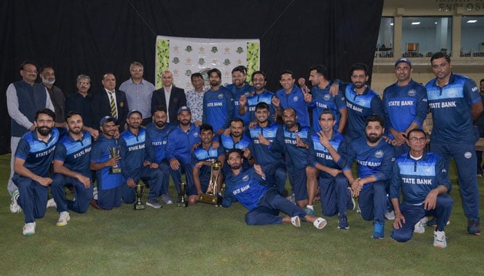 The State Banks team in a group photo at Iqbal Stadium on Oct 16, 2024. — Facebook/PakistanCricketBoard