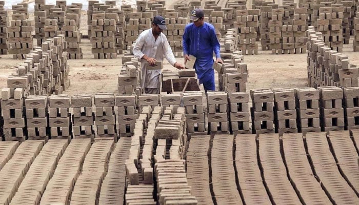 Representational image shows labourers are busy in their work at brick kilns on May 1 every year on May 1, 2024. — APP