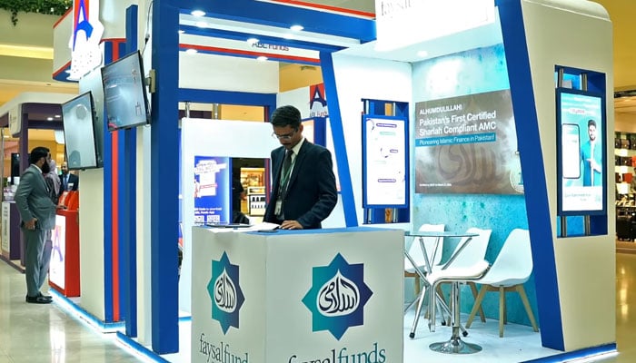 An Employee stands at the Faysal Funds booth during Investor Weekend 2024 on October 15, 2024. — Screengrab via Facebook/CDC of Pakistan Limited